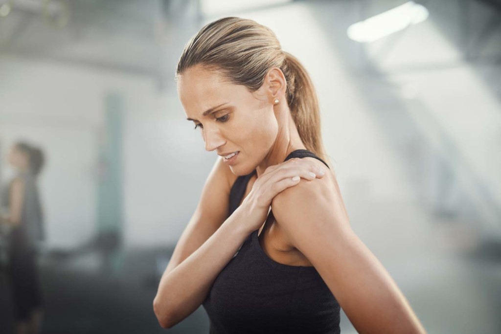 Woman nursing shoulder injury